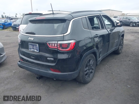2020 Jeep Compass Latitude with VIN 3C4NJCBB8LT206001, listed as a IAAI auction lot 42352933 with 58,406 mi miles and . Bid and sale history available at DreamBid. Image 4.