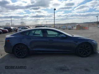 2021 Tesla Model S Plaid with VIN 5YJSA1E60MF455768, listed as a IAAI auction lot 41603504 with 27,398 mi miles. Bid and sale history available at carsss.com. Image 13.