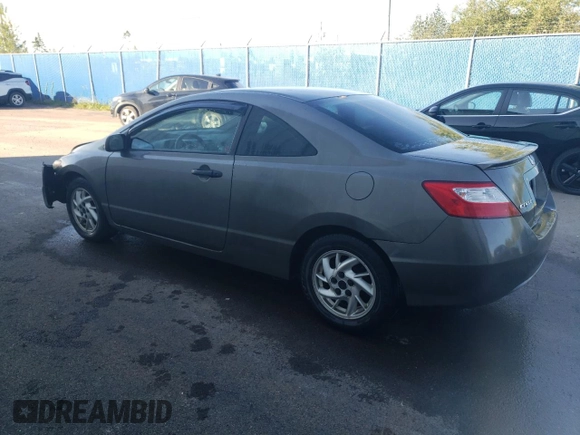 2006 Honda Civic Cpe DX with VIN 2HGFG12276H000805, listed as a Copart auction lot 71200794 with 309,041 mi miles and Salvage Title. Bid and sale history available at carsss.com. Image 2.