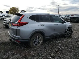 2018 Honda CR-V EX with VIN 7FARW1H59JE001537, listed as a Copart auction lot 80751724 with 73,294 mi miles and Salvage Title. Bid and sale history available at carsss.com. Image 3.