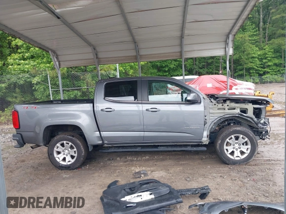 2018 Chevrolet Colorado 4WD LT z VIN 1GCGTCEN6J1146104, wystawiony jako IAAI lot #42338356 z przebiegiem 71 043 mil mil oraz . Historia ofert i sprzedaży dostępna na DreamBid. Obrazek 14.