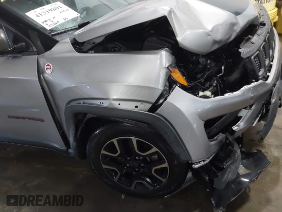 2019 Jeep Compass Trailhawk with VIN 3C4NJDDB9KT765459, listed as a IAAI auction lot 41319891 with 83,860 mi miles and . Bid and sale history available at carsss.com. Image 18.