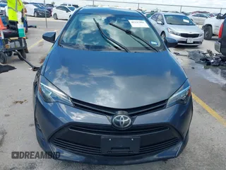 2018 Toyota Corolla L with VIN 5YFBURHE1JP832911, listed as a IAAI auction lot 42237901 with 92,158 mi miles and . Bid and sale history available at DreamBid. Image 12.