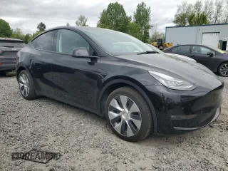 2021 Tesla Model Y Long Range with VIN 5YJYGDEE2MF243763, listed as a Copart auction lot 54941665 with 39,516 mi miles and Clean Title. Bid and sale history available at DreamBid. Image 4.