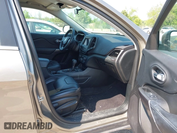 2019 Jeep Cherokee Latitude Plus with VIN 1C4PJMLN8KD148533, listed as a IAAI auction lot 42480637 with 63,473 mi miles and . Bid and sale history available at DreamBid. Image 5.