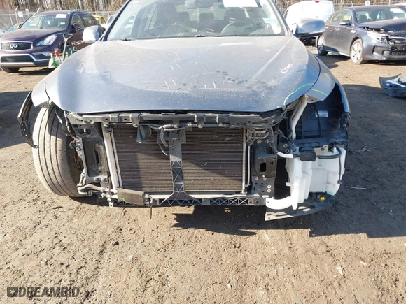 2015 Infiniti Q50 Premium with VIN JN1BV7AP4FM334762, listed as a IAAI auction lot 41443049 with 99,519 mi miles. Bid and sale history available at carsss.com. Image 6.