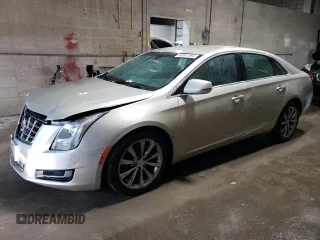 2014 Cadillac XTS with VIN 2G61L5S38E9131581, listed as a Copart auction lot 86501384 with 135,293 mi miles and Salvage Title. Bid and sale history available at carsss.com. Image 1.