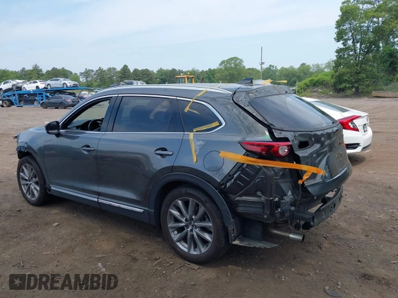 2020 Mazda CX-9 Grand Touring with VIN JM3TCBDY4L0408920, listed as a IAAI auction lot 42325272 with 45,837 mi miles and . Bid and sale history available at DreamBid. Image 14.