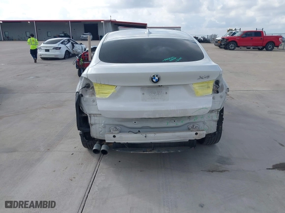 2015 BMW X4 xDrive28i with VIN 5UXXW3C53F0M88714, listed as a IAAI auction lot 41483692 with 132,054 mi miles. Bid and sale history available at carsss.com. Image 6.