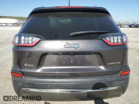 2019 Jeep Cherokee Limited with VIN 1C4PJLDB0KD487933, listed as a Copart auction lot 52788155 with 125,083 mi miles and Salvage title. Bid and sale history available at DreamBid. Image 6.
