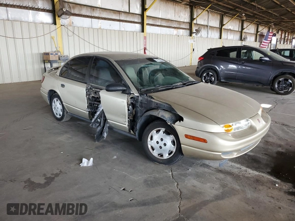 2002 Saturn SL z VIN 1G8ZH52842Z165459, wystawiony jako Copart lot #57273035 z przebiegiem 84 482 mil mil oraz Szkoda całkowita • Salvage title. Historia ofert i sprzedaży dostępna na DreamBid. Obrazek 4.