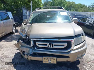 2011 Honda Ridgeline RTL with VIN 5FPYK1F57BB452321, listed as a IAAI auction lot 42306915 with Not provided miles and . Bid and sale history available at DreamBid. Image 12.