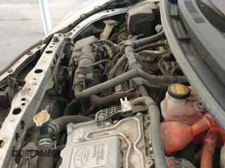 2014 Toyota Prius One z VIN JTDKDTB36E1566087, wystawiony jako IAAI lot #42907854 z przebiegiem 134 510 mil mil oraz . Historia ofert i sprzedaży dostępna na DreamBid. Obrazek 19.