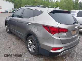 2017 Hyundai Santa Fe 2.4L z VIN 5XYZU3LB8HG421397, wystawiony jako IAAI lot #41961915 z przebiegiem 102 594 mil mil oraz . Historia ofert i sprzedaży dostępna na DreamBid. Obrazek 3.