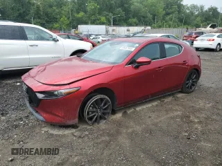 2019 Mazda 3 Premium with VIN JM1BPANM9K1144343, listed as a Copart auction lot 64467945 with 107,724 mi miles and Salvage title. Bid and sale history available at DreamBid. Image 1.