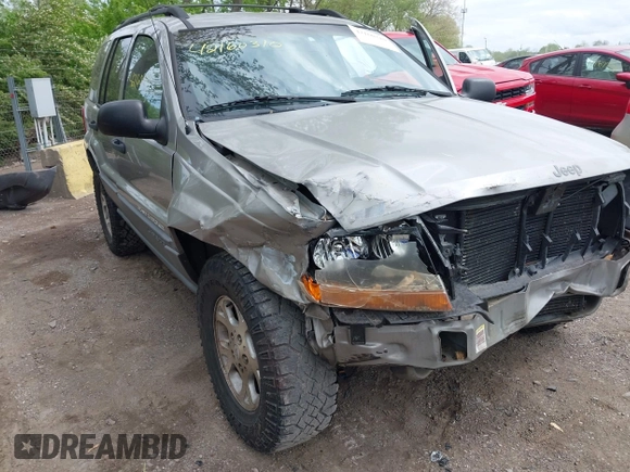 2001 Jeep Grand Cherokee Laredo z VIN 1J4GW48S01C658017, wystawiony jako IAAI lot #42160310 z przebiegiem 220 309 mil mil oraz . Historia ofert i sprzedaży dostępna na DreamBid. Obrazek 6.