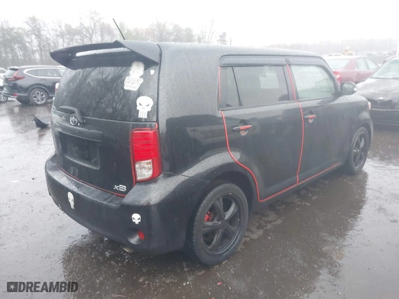2012 Scion xB with VIN JTLZE4FE3CJ008728, listed as a IAAI auction lot 42000043 with 172,199 mi miles. Bid and sale history available at carsss.com. Image 4.