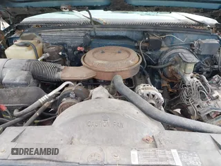 1994 GMC Suburban z VIN 1GKEC16K2RJ750376, wystawiony jako IAAI lot #42278734 z przebiegiem 185 403 mil mil oraz . Historia ofert i sprzedaży dostępna na DreamBid. Obrazek 10.
