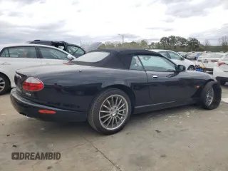 2006 Jaguar XK with VIN SAJDA42C462A44968, listed as a Copart auction lot 75758524 with 77,266 mi miles and Salvage Title. Bid and sale history available at carsss.com. Image 3.