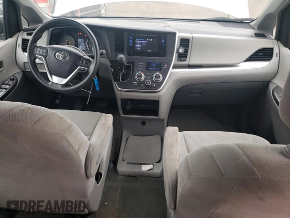 2015 Toyota Sienna L with VIN 5TDZK3DCXFS620092, listed as a Copart auction lot 61606095 with 130,624 mi miles and Salvage title. Bid and sale history available at DreamBid. Image 8.