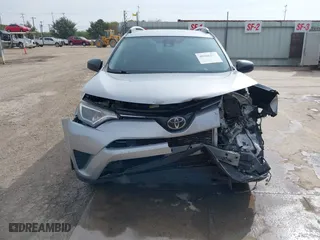 2018 Toyota RAV4 LE with VIN 2T3ZFREV2JW464807, listed as a IAAI auction lot 40966277 with 113,053 mi miles. Bid and sale history available at carsss.com. Image 13.