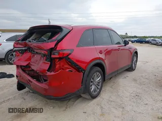 2024 Mazda CX-90 Preferred with VIN JM3KKBHDXR1114186, listed as a IAAI auction lot 41877143 with 29,500 mi miles and . Bid and sale history available at DreamBid. Image 4.