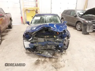 2013 Ford Fusion Titanium Hybrid with VIN 3FA6P0RU9DR320909, listed as a IAAI auction lot 41477530 with 108,153 mi miles. Bid and sale history available at carsss.com. Image 12.
