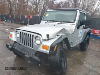 2006 Jeep Wrangler Sport Right Hand Drive with VIN 1J4F449SX6P764491, listed as a IAAI auction lot 41709726 with 290,798 mi miles. Bid and sale history available at carsss.com. Image 17.