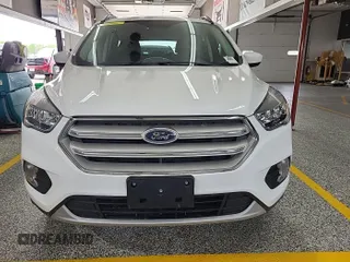 2018 Ford Escape SE z VIN 1FMCU9GD3JUC89119, wystawiony jako IAAI lot #42421139 z przebiegiem 42 209 mil mil oraz . Historia ofert i sprzedaży dostępna na DreamBid. Obrazek 7.