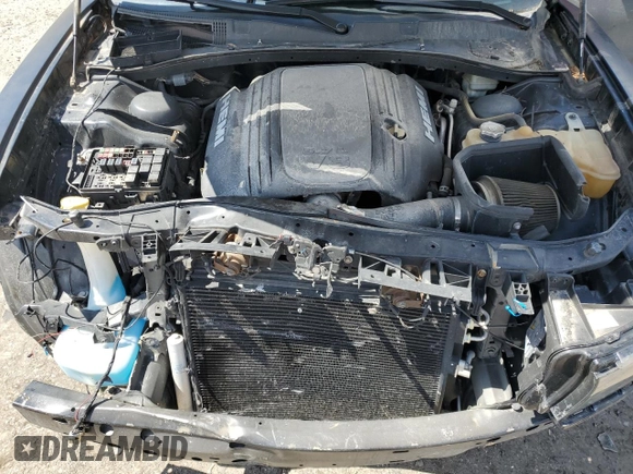 2015 Dodge Charger RT with VIN 2C3CDXCT9FH784672, listed as a Copart auction lot 58190615 with 121,033 mi miles and Salvage title. Bid and sale history available at DreamBid. Image 11.
