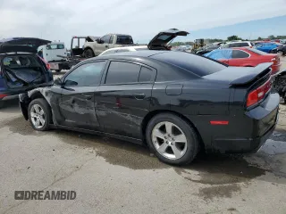 2014 Dodge Charger SE with VIN 2C3CDXBG9EH370942, listed as a Copart auction lot 69511654 with 220,917 mi miles and Salvage Title. Bid and sale history available at carsss.com. Image 2.