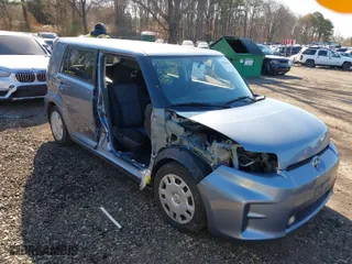 2012 Scion xB with VIN JTLZE4FE1CJ010574, listed as a IAAI auction lot 41858422 with 65,862 mi miles. Bid and sale history available at carsss.com. Image 1.