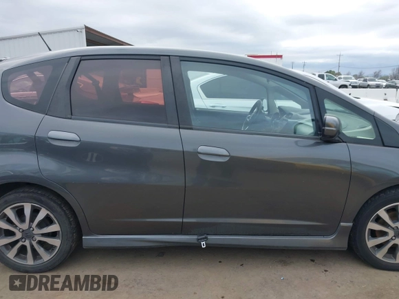 2012 Honda Fit Sport with VIN JHMGE8H50CC035136, listed as a IAAI auction lot 41657267 with 331,783 mi miles. Bid and sale history available at carsss.com. Image 13.