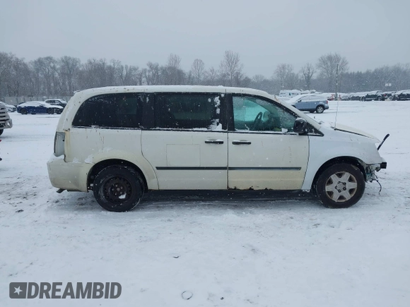 2009 Dodge Grand Caravan with VIN 2D8HN11E19R703857, listed as a IAAI auction lot 41195565 with 199,776 mi miles and . Bid and sale history available at DreamBid. Image 14.