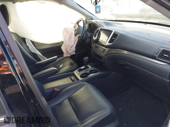 2016 Honda Pilot EX-L with VIN 5FNYF6H77GB108567, listed as a IAAI auction lot 41704962 with 193,873 mi miles. Bid and sale history available at carsss.com. Image 5.