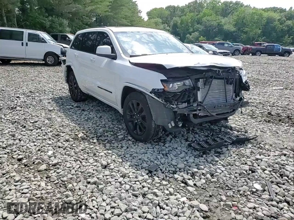 2018 Jeep Grand Cherokee Altitude with VIN 1C4RJFAGXJC122688, listed as a Copart auction lot 61290525 with 106,671 mi miles and Salvage title. Bid and sale history available at DreamBid. Image 14.
