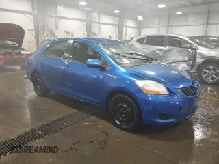 2009 Toyota Yaris with VIN JTDBT903991315725, listed as a Copart auction lot 52566735 with 177,044 mi miles and Salvage Title. Bid and sale history available at DreamBid. Image 4.