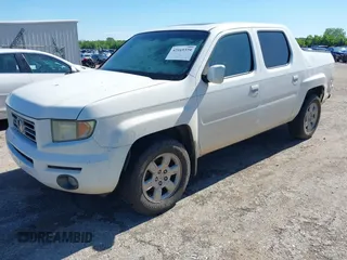 2006 Honda Ridgeline RTL with VIN 2HJYK16506H562857, listed as a IAAI auction lot 42169379 with 154,194 mi miles. Bid and sale history available at carsss.com. Image 2.