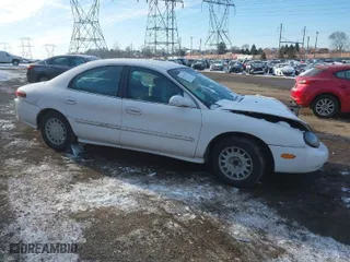 1997 Mercury Sable GS with VIN 1MELM50U6VA657452, listed as a IAAI auction lot 41415751 with 185,235 mi miles. Bid and sale history available at carsss.com. Image 1.