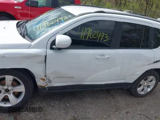 2016 Jeep Compass Latitude with VIN 1C4NJDEB1GD616457, listed as a IAAI auction lot 41962493 with 80,717 mi miles and . Bid and sale history available at DreamBid. Image 14.