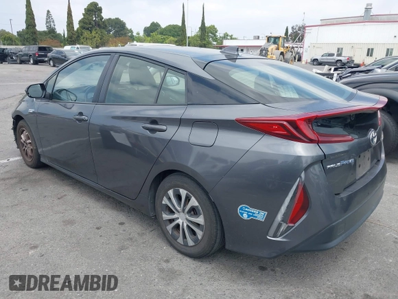 2021 Toyota Prius LE with VIN JTDKAMFP0M3193305, listed as a IAAI auction lot 42283494 with 322,523 mi miles and . Bid and sale history available at DreamBid. Image 3.