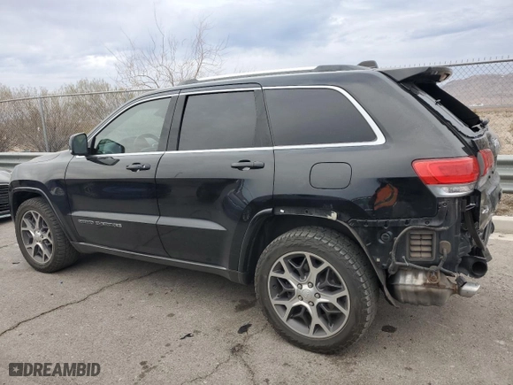 2018 Jeep Grand Cherokee Limited with VIN 1C4RJFBT9JC143771, listed as a Copart auction lot 85987184 with 55,549 mi miles and Salvage Title. Bid and sale history available at carsss.com. Image 2.