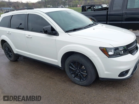 2019 Dodge Journey SE with VIN 3C4PDCBB1KT845643, listed as a IAAI auction lot 41877311 with 85,824 mi miles and . Bid and sale history available at DreamBid. Image 1.