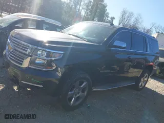 2015 Chevrolet Tahoe LTZ with VIN 1GNSKCKC3FR222135, listed as a IAAI auction lot 41816033 with 180,393 mi miles. Bid and sale history available at carsss.com. Image 14.