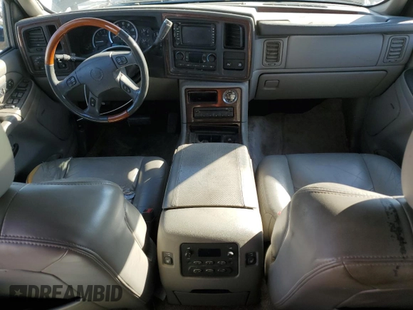 2003 Cadillac Escalade z VIN 1GYEC63T63R317510, wystawiony jako Copart lot #48515195 z przebiegiem 398 303 mil mil oraz Czysty tytuł • Clean title. Historia ofert i sprzedaży dostępna na DreamBid. Obrazek 8.