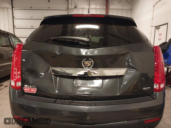 2014 Cadillac SRX with VIN 3GYFNAE34ES665630, listed as a IAAI auction lot 41315281 with 99,009 mi miles and . Bid and sale history available at DreamBid. Image 6.