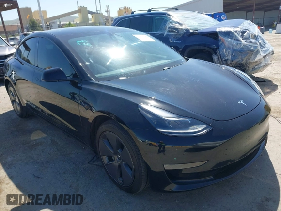 2021 Tesla Model 3 Long Range with VIN 5YJ3E1EB2MF065583, listed as a IAAI auction lot 42067399 with 52,333 mi miles. Bid and sale history available at carsss.com. Image 1.