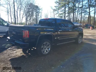 2018 GMC Sierra 1500 Denali with VIN 3GTU2PEJ5JG308087, listed as a IAAI auction lot 41343443 with 108,644 mi miles. Bid and sale history available at carsss.com. Image 4.