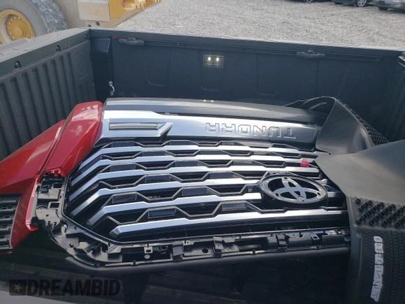 2022 Toyota Tundra Capstone Hybrid z VIN 5TFVC5DB7NX009329, wystawiony jako Copart lot #36216833 z przebiegiem 3 226 mil mil oraz . Historia ofert i sprzedaży dostępna na DreamBid. Obrazek 13.