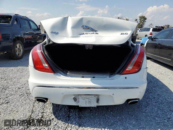 2015 Jaguar XJ with VIN SAJWA1CZ8F8V81637, listed as a Copart auction lot 55619555 with 88,328 mi miles and Salvage Title. Bid and sale history available at DreamBid. Image 6.